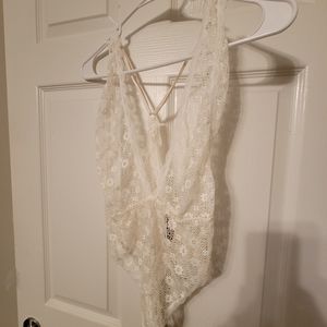 Lace Teddy, with adjustable straps.